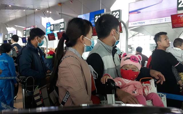 Khuyến cáo đeo khẩu trang tại bến tàu, nhà ga